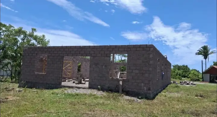 The tabernacle under construction: block walls up, no roof yet